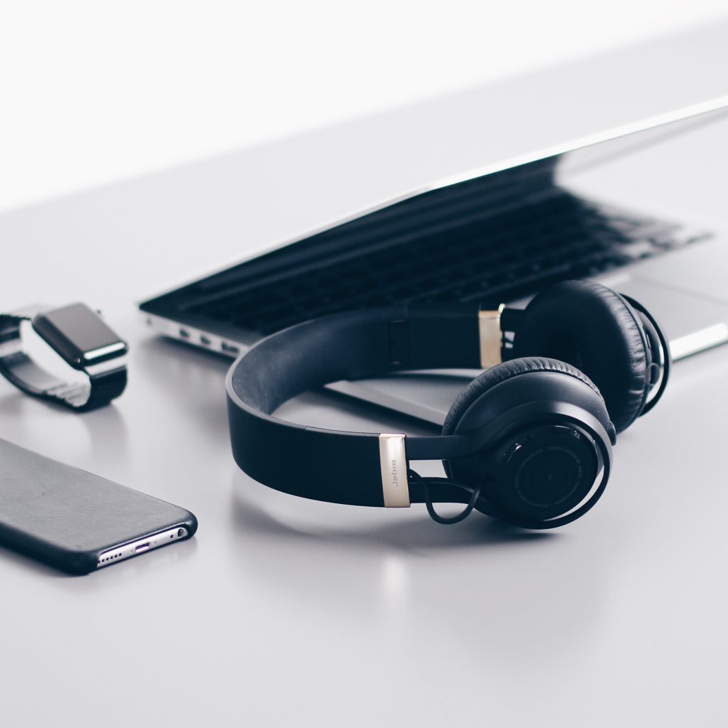 laptop, phone, headphones, watch